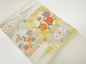 綴れ格天井に丸文・花々模様織出し名古屋帯